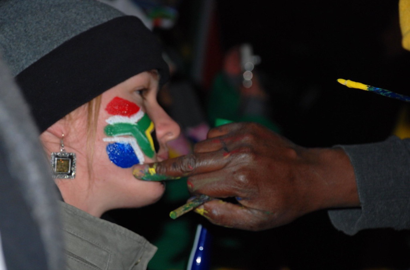 South Africa fans celebrating in the colours of the Rainbow Nation