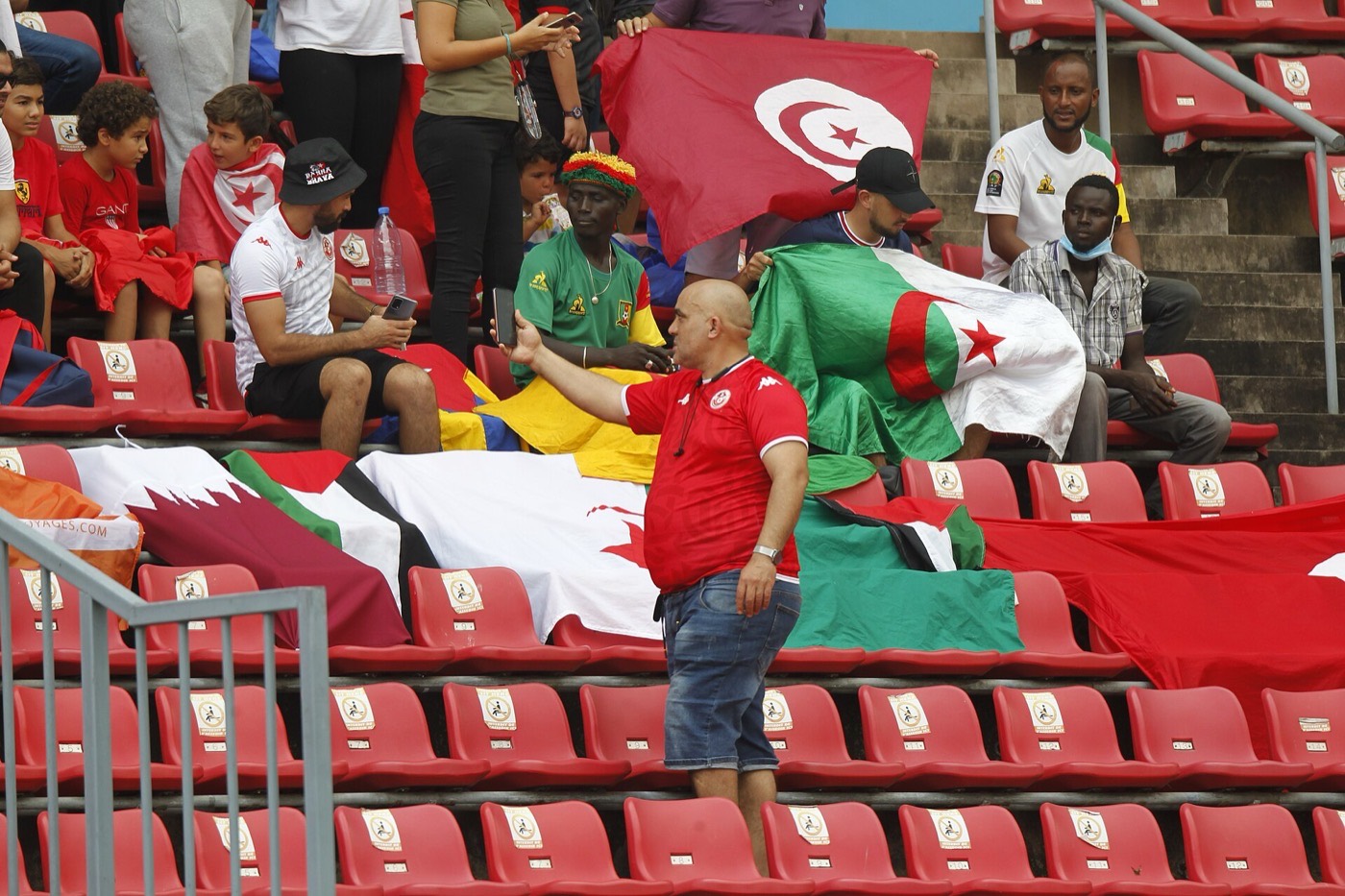 Tunisia supporters with the national flag in the stands at a match